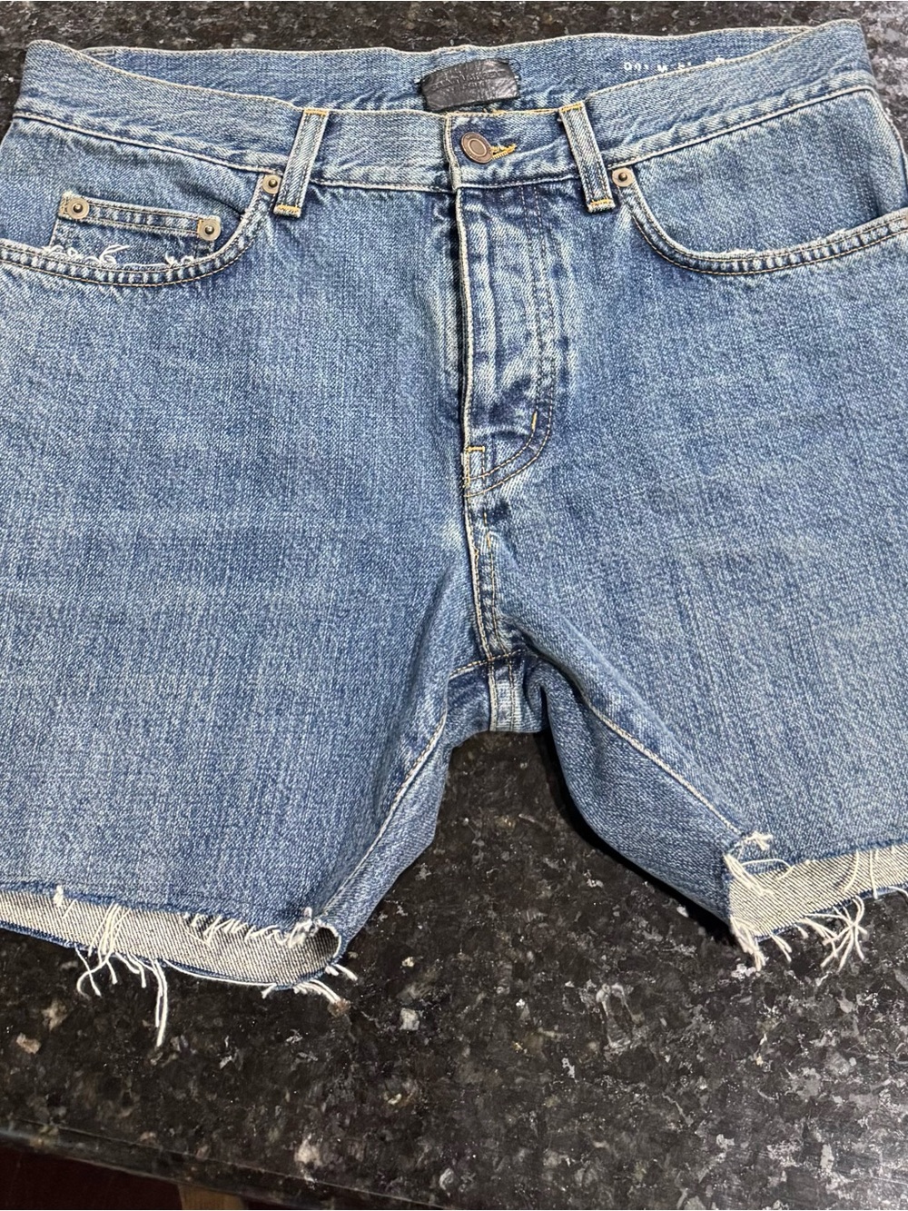Saint Laurent Men’s Blue Denim button fly denim cutoff Shorts